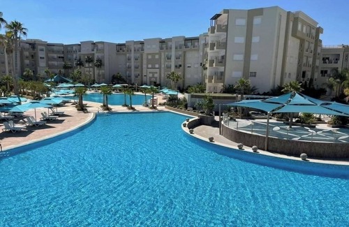Jemmal Apartment | Pool-view apartment in a charming, well-secured residence