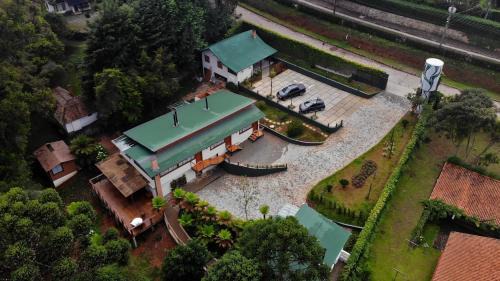 Monte Verde House | Pousada Canto da Nascente