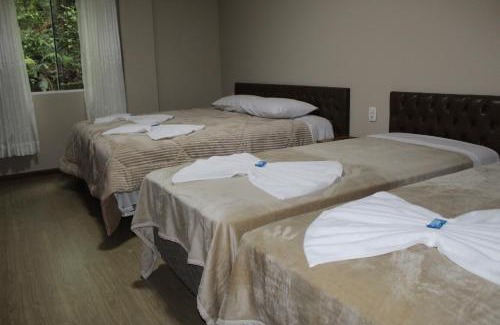 Portico Hotel | Pousada Essência Serrana Gramado