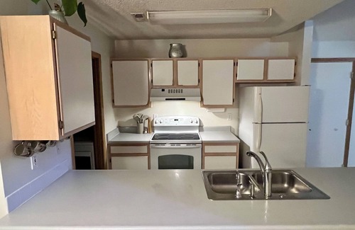 Lawrence House | Practical Zen: 4-bedroom 5-bed 2-bath close to everything, flexible, cookies.