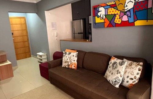 Praia Grande Apartment | Praia Grande Paradise! Feet in the sand! Facing the Sea.