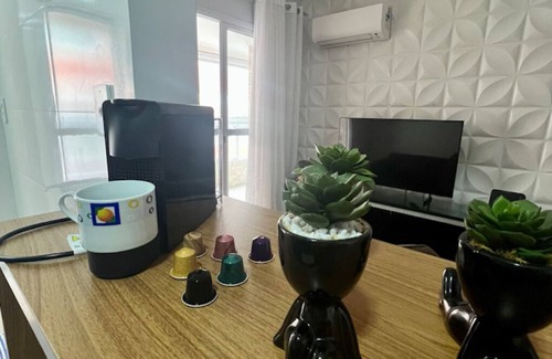 Praia Grande Apartment | Praia Grande Paradise! Feet in the sand! Facing the Sea.