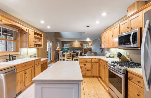 Emily House | Pristine home with sandy beach, firepit, dock and pontoon. ATV trails nearby.