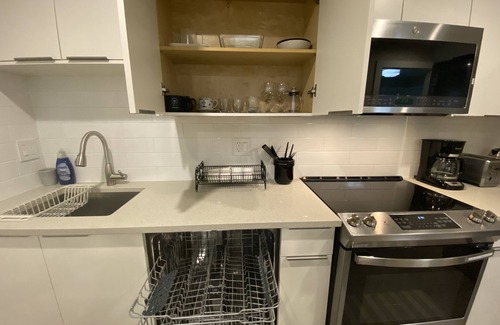 Lower Lonsdale House | Private 1 Bedroom Suite with Assigned Parking