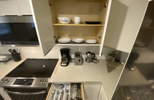 Lower Lonsdale House | Private 1 Bedroom Suite with Assigned Parking
