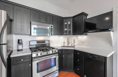 Elkhart Lake Condo | Private Beach, Pools & Full-Kitchen