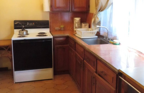 San Pedro Apartment | Private, Ground Floor Apartment with Backyard in a Central, Residential Area