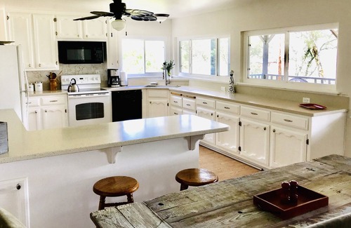 Lotus House | Private River and Mountain Views from Cozy Cabin, Covered Deck and Beach!