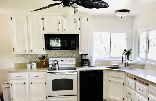 Lotus House | Private River and Mountain Views from Cozy Cabin, Covered Deck and Beach!