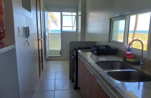Praia do Baixio Apartment | Property standing in the sand