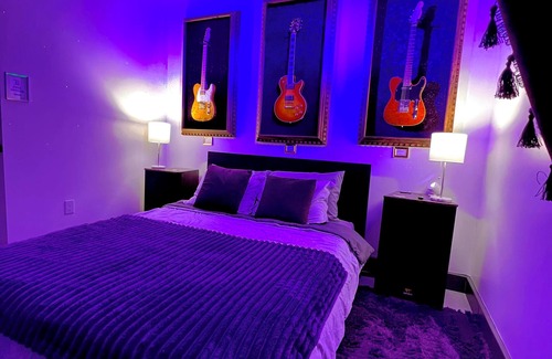 Bearss Plaza Hotel | Purple Rain Hotel Room with Pool and Hot Tub