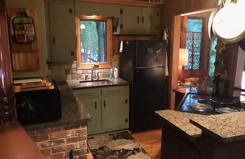 Mountain Rest Cabin | Quaint two bedroom cabin just a few steps away from and on Mountain Rest Lake.