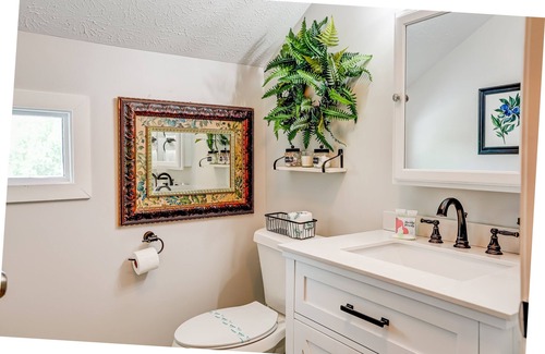 Epworth Cottage | Quaint wooded escape with wraparound deck, firepit, & fast WiFi - dog-friendly