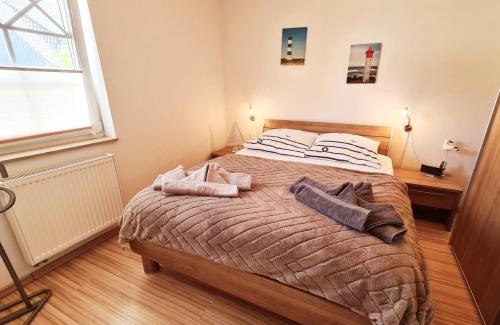 Zingst Apartment | Quartier4u - 4 Sterne - inklusive eigene BikeBox mit Strom - Wäschepaket - POWER WLAN - Parkplatz - early CheckIn - # Bestpreisgarantie #