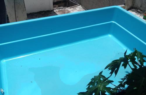 Nazareth House | Quarto com vista pra Piscina