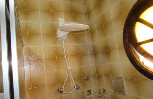 Vila Gardenia House | Quarto Suíte Pitanga