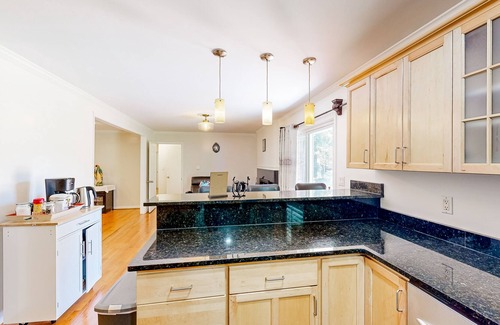 Tucker House | Quiet home in a convenient location with large yard, patio, & fireplace