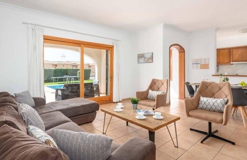 Sant Jaume Mediterrani Villa | R 5029 Villa Argus with Dishwasher,Comfortable Seating & Dining Facilities.