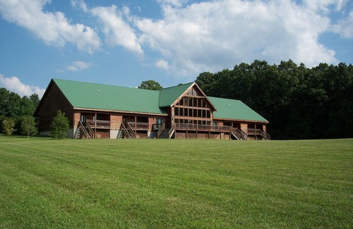 Spencer Cabin | Recline in the room in front of the fireplace with your PET