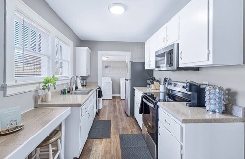 Lupton City House | Red Bud Summary: Red