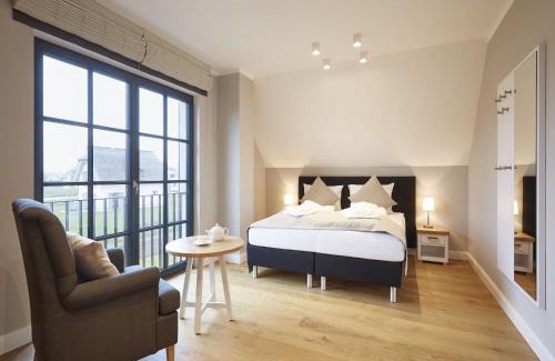 Kreptitz House | Reetland am Meer - Premium Reetdachvilla mit 3 Schlafzimmern, Sauna und Kamin F09