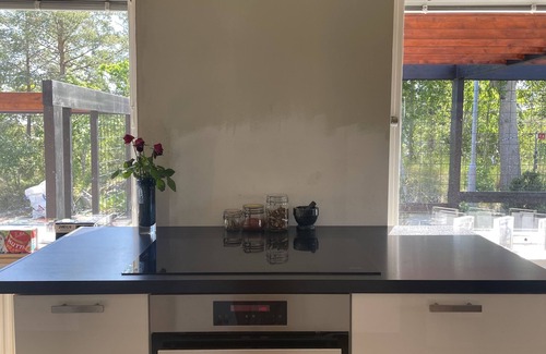 Saltsjobaden House | Refurbished 60s villa w astonishing tree top view, evening sun, close to the sea