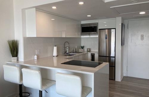 Bay Esplanade Condo | Regatta Beach Club C-611 modern oceanfront studio w/private balcony. 3 month min