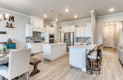 Yukon House | Relax & enjoy large private backyard with pool, hot tub & golf green!