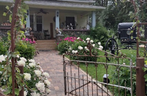 Birchwood Apartment | Relax in our English Garden King Suite at The Cobblestone Bed & Breakfast