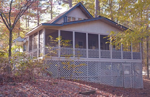 Pine Mountain Ski Chalet | Relax on your screened in porch in this pet friendly chalet!