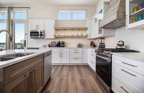 Ludington Condo | Relax & Unwind in a New Building with a New Heated Pool & Hot Tub, Sleep 13!