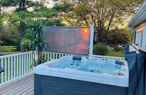 Athens House | Relaxing Pondfront Escape with Hot Tub & Outdoor Fire Deck
