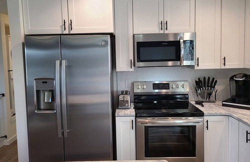 Spokane Valley Apartment | Remodeled, modern, FREE parking, large fenced yard, family-friendly