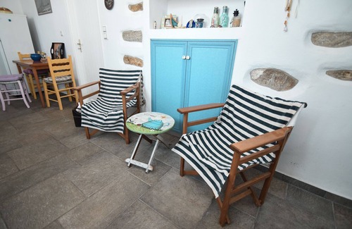 Platis Gialos House | Renovated haystack with Cycladic details.