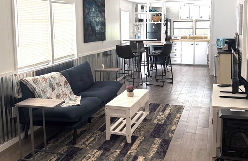 Weeki Wachee Gardens Cottage | Rent Cottage and/or RV site 37ft ' Fish, Kayaks, Fire Pit, Dock, Beach, Swim