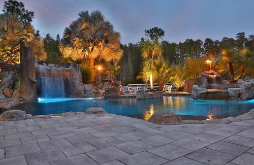 Greater Northdale House | Resort style pool with lazy river, grotto, and hot tub! Dog-Friendly!