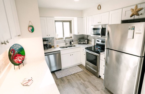 Tybee Island Apartment | Resort views - Huge Balcony - Steps to the beach!