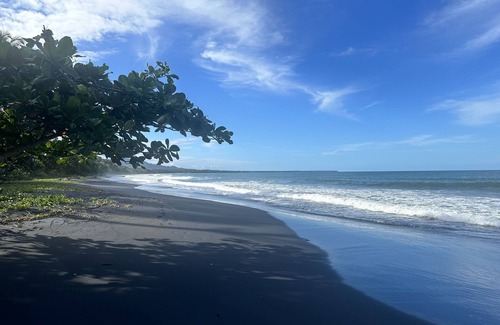 Cahuita House | Rest , Restore, and Relax steps away from the beautiful black sands beach.