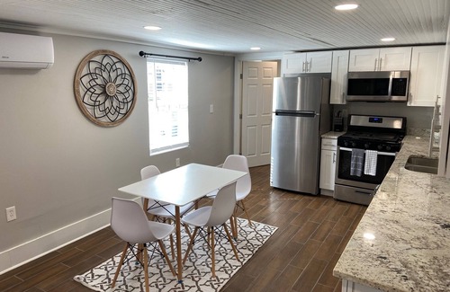 Uptown Historic District House | Restored Rustic Uptown Getaway Walk to Everything