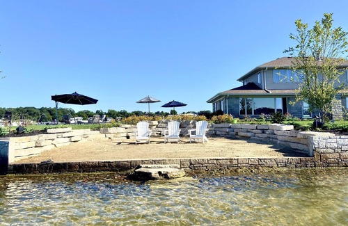 La Porte House | Retreat on the point of Pine Lake with your own pool/ hot tub.