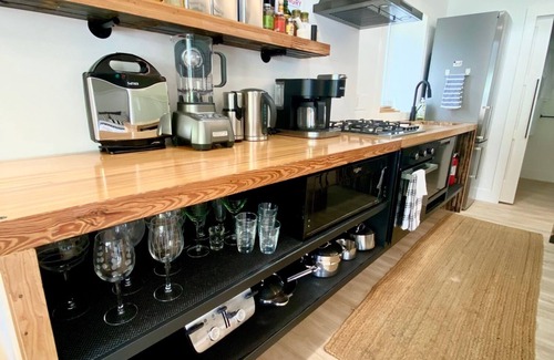 Shorewood-Tower Hills-Harbert House | Retreat WithInn-Relaxation Centrally Located to Beaches and Walkable Restaurants