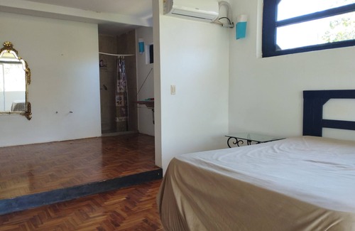 Caucaguita Bed & Breakfast | Room with balcony and view