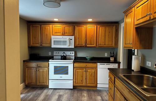 Sebago House | Roomy 3 bedroom with fireplace & wood-burning stove steps away from Sebago Lake