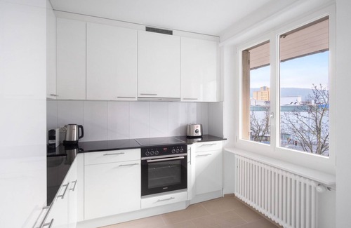 Oerlikon Apartment | Roomy Oerlikon 3.5 Room w/Parking, 1min to Train Station, by Blueground
