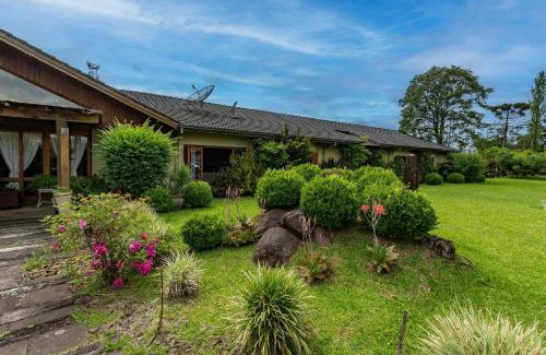 Carniel House | Rosa Casa Sereno 5 suítes