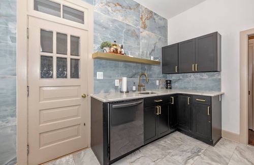 Frederick Apartment | Royalty on the Park: bar, movie theater, & patio