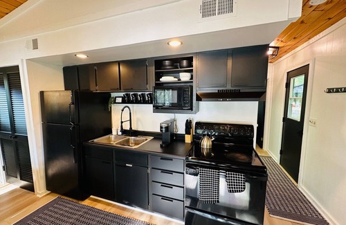 New London Cabin | Ruby's Red Door Retreat on Swenson Lake welcomes you to serenity