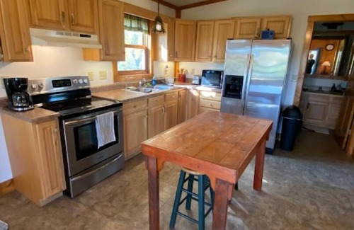 Opheim Cabin | Rustic and Secluded 1 Bedroom Cabin Retreat. Located on Private Stocked Pond.