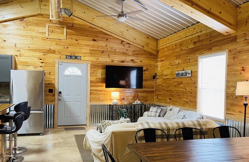 Arley Cabin | Rustic chic cabin on the lake, fire pit and peaceful lake views!