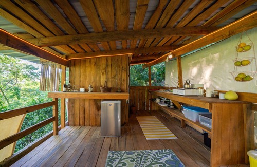 Jarabacoa Cottage | Rustic earthen two story cottage in Quintas del Bosque sleeps two couples.